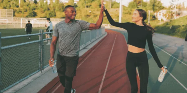 Couples giving hi five with happy mindset